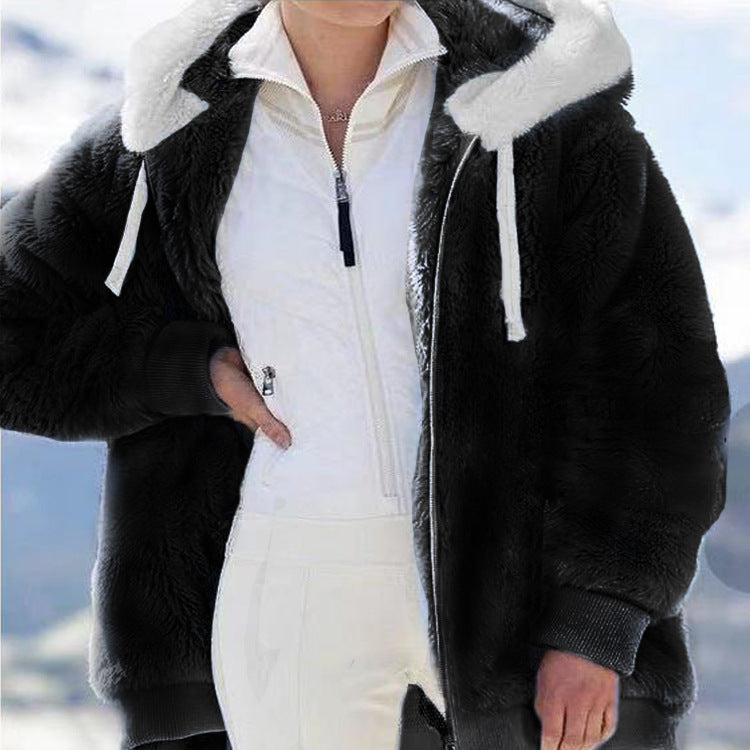 Fleece jacket with hood and fur lining.