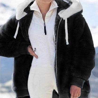 Fleece jacket with hood and fur lining.