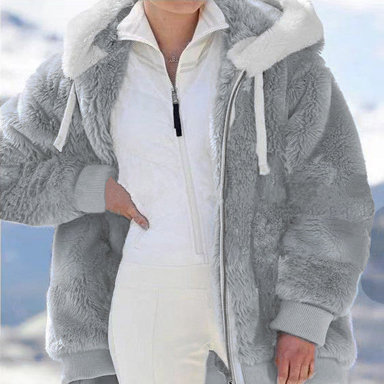 Fleece jacket with hood and fur lining.