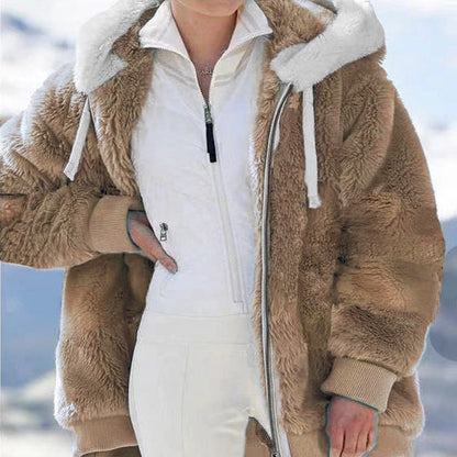 Fleece jacket with hood and fur lining.