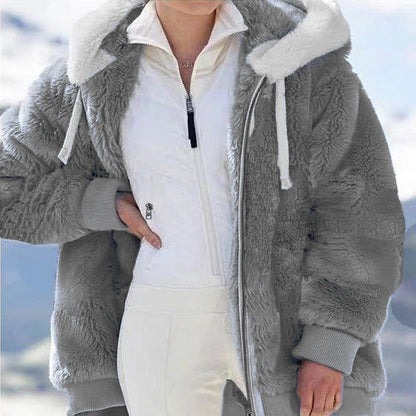 Fleece jacket with hood and fur lining.